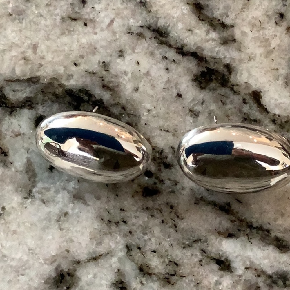 Oval shaped sterling silver pierced earrings